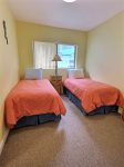 Twin Bedroom beds and opening window